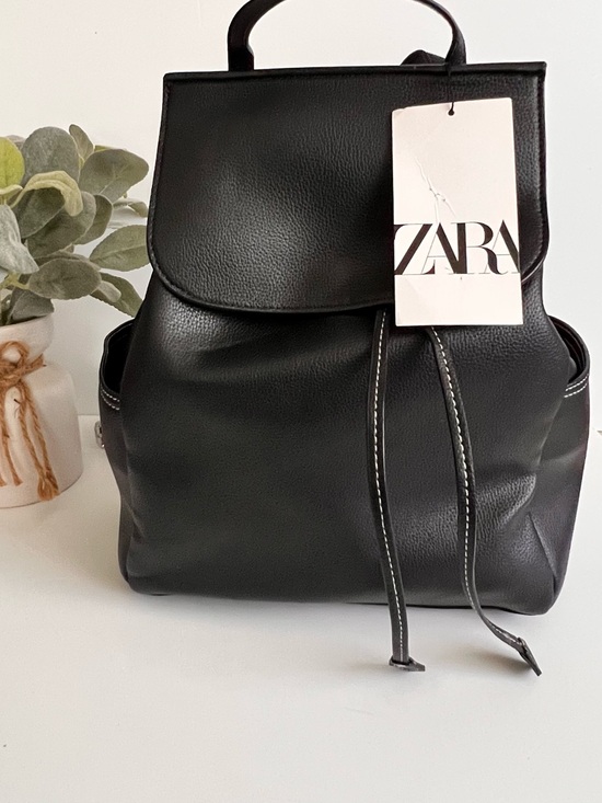 bison leather backpacks Top Zip Backpack #755 | Black Model:SWSPCII701-H and an interior zippered exterior-color-yellow Storm Original Deep Diving